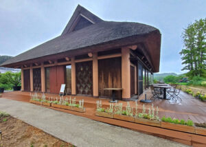 Restaurant with pillars made from recycled paper and roof made from local grass